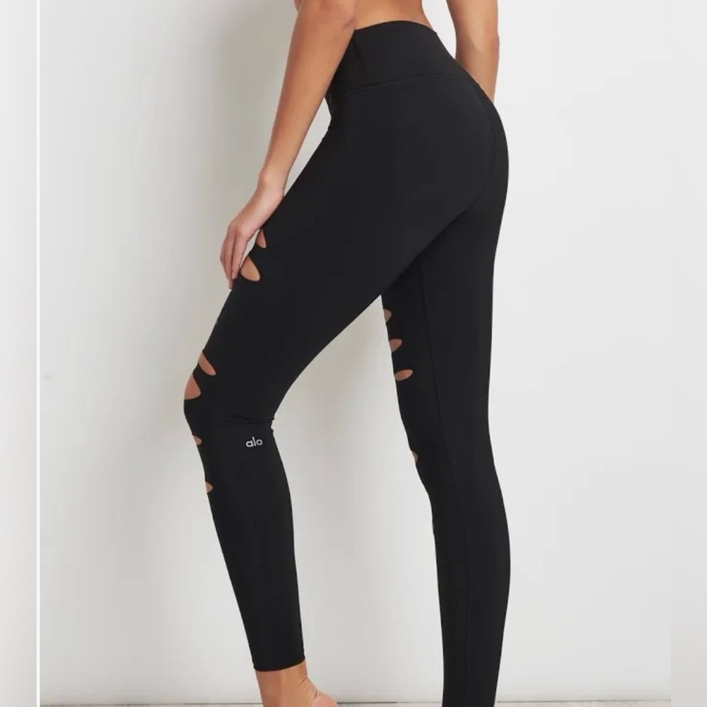 Alo Black high waisted “cut out” leggings.